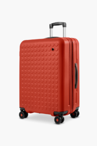 Dot-Drops : valise rouge avec design intemporel 