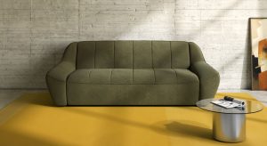 Le canapé-lit Venus La Maison Convertible, alliance d’élégance et de profondeur en tissu olive, conjugue design et confort.