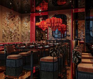 Salle du restaurant UNI Paris avec décor inspiré du Japon impérial et ambiance feutrée.